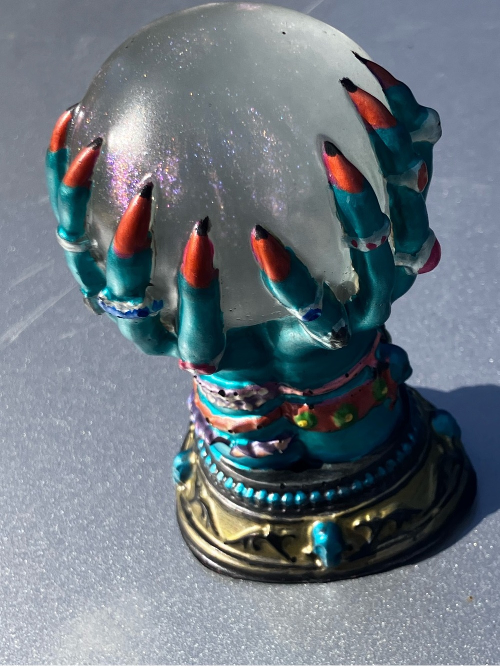 Witches crystal ball and hands